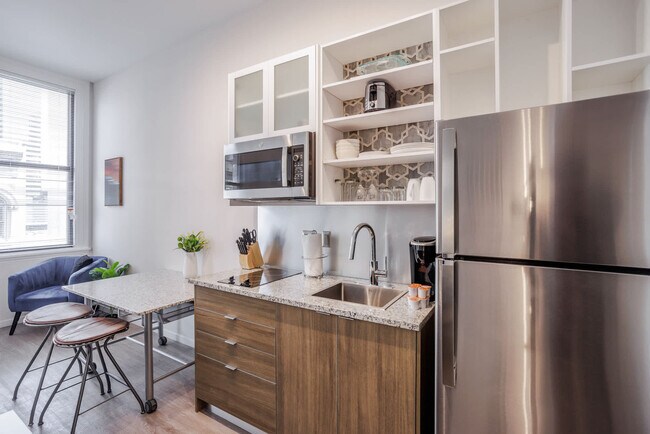 Building Photo - 9-JAN-JAN E 4th St