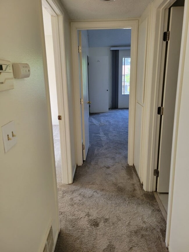 Building Photo - Plenty of Natural Light! Spacious Townhouse conveniently across Dominguez Hills!
