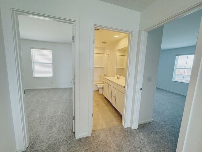 Building Photo - MOVE IN SPECIALS!! 15 DAYS RENT FREE!! New 5-Bedroom Home in Phoenix with Upgrades!