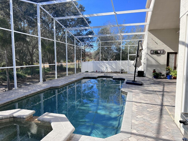 Building Photo - Stunning 5-Bedroom Pool Home in Gated Spyg...