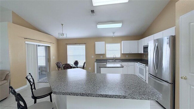 Building Photo - 10216 Oasis Palm Dr