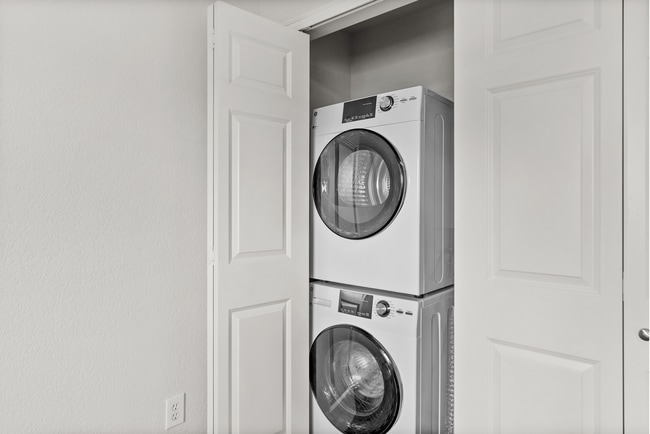 Efficient and stylish, this laundry setup offers convenience without compromising space. - Vista Terrace Apartments