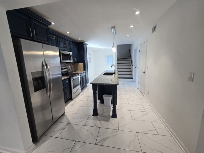 Building Photo - Welcome to The Buchanan Retreat – Modern 4...