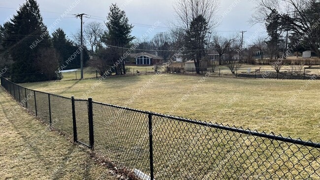 Building Photo - Peaceful 3-Bedroom Home in a Wooded Rockford Neighborhood