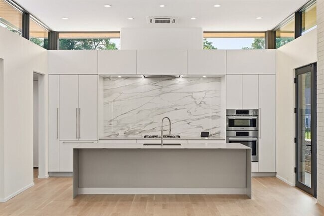 Building Photo - Experience contemporary luxury in this exceptional custom-built Midtown Tulsa residence, where so...