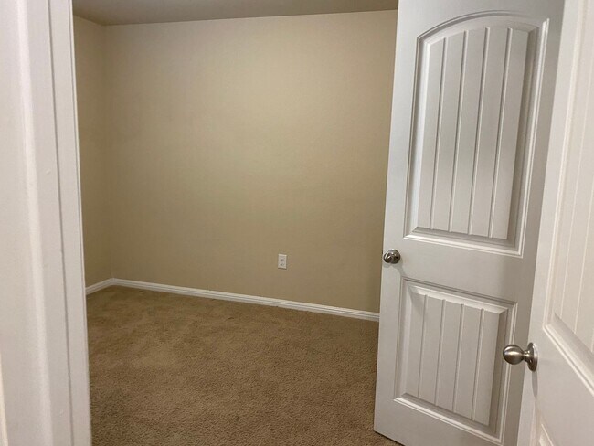 Building Photo - Three Bedroom, Two Bath, Two Car Garage, Washer and Dryer are included.