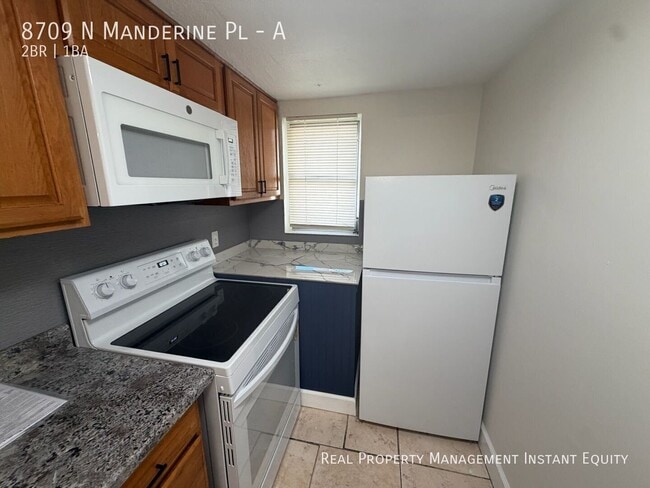 Building Photo - 8709 N Mandarine Pl