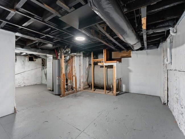 Building Photo - Beautifully Renovated 4-Bedroom Home with Designer Kitchen, Updated Bath & Central Air – Availabl...