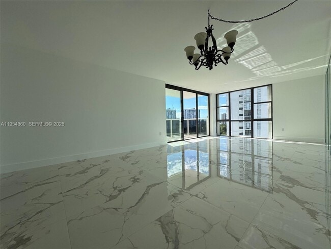 Building Photo - 3675 N Country Club Dr