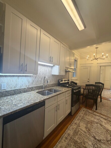 Granite counterops, marble backsplash - 2808 Floyd Ave