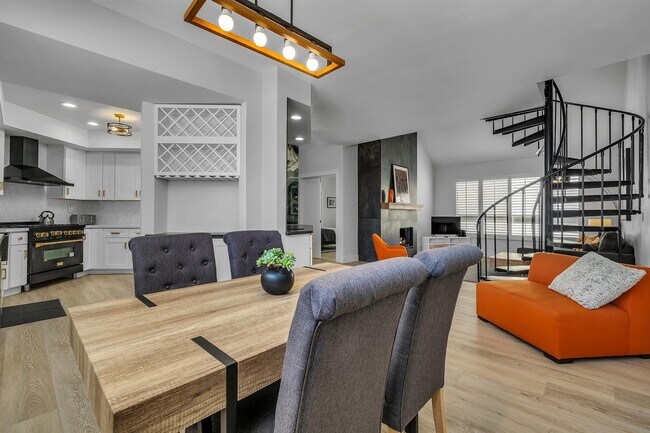 Kitchen table, view into kitchen and great room - 1412 N Crescent Heights Blvd