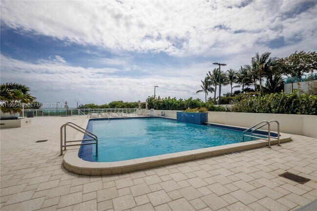 Building Photo - 6917 Collins Ave