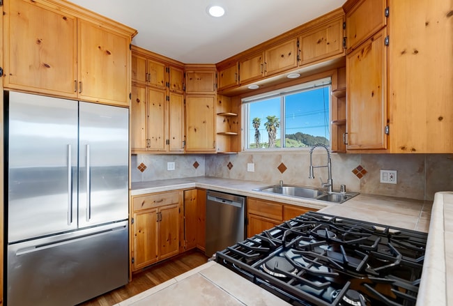 Kitchen with View and Custom Cabinets - 10 Tucker Ave