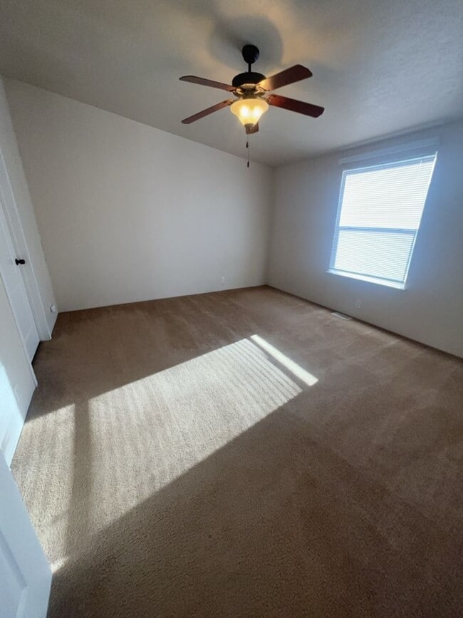 Building Photo - Hellgate Elementary School Area - 3 Bed, 2 Bath, Garage and a Fenced Yard