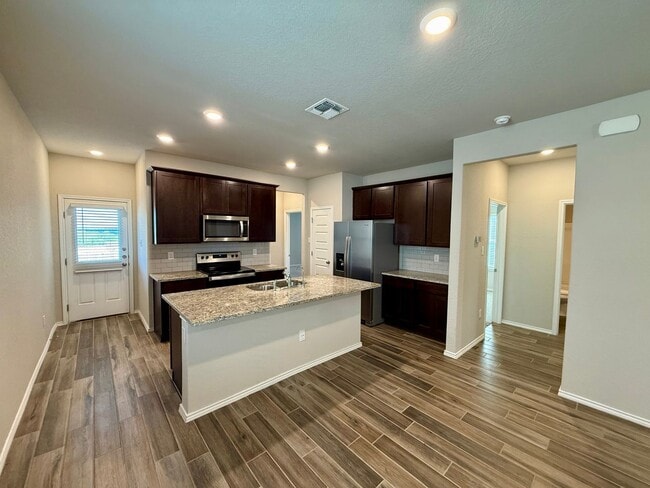 Building Photo - Lovely 1-story 4 bedroom/2 bath home is an...