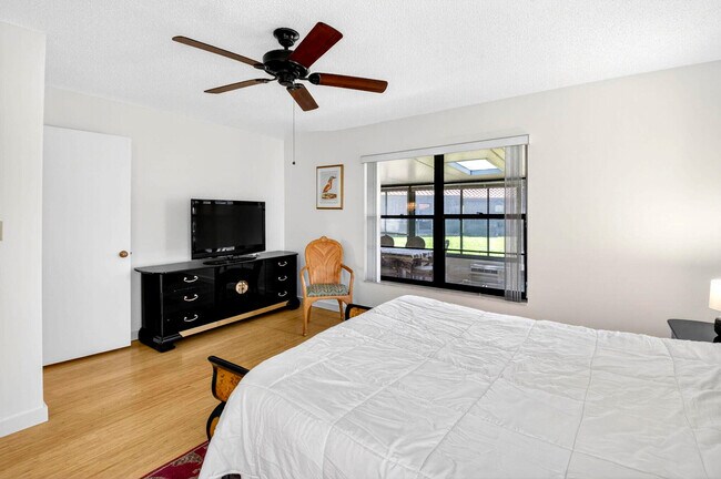 Building Photo - 10938 Roebelini Palm Ct