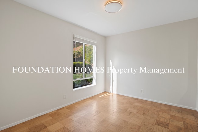 Building Photo - Bright & Tranquil End Unit!  A/C! Parking! Community Pool! FOUNDATION