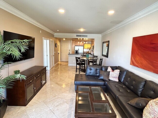Building Photo - Gorgeous fully furnished strip view condo ...