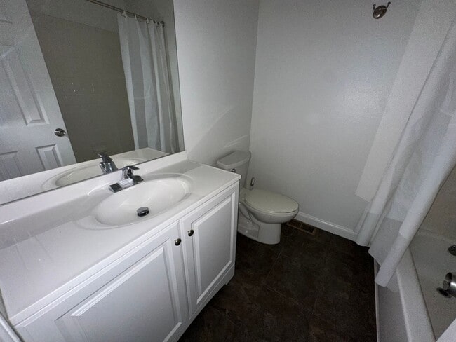 Building Photo - LOCATION LOCATION!! Open and inviting 3-be...