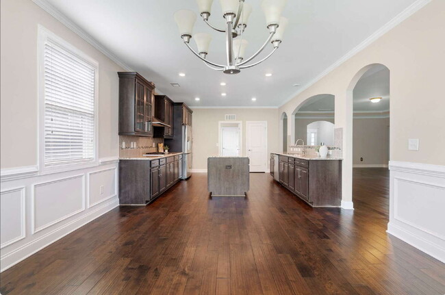 Building Photo - Luxurious 4-Bedroom Retreat with Third Floor Bonus Room & Fenced-in Backyard