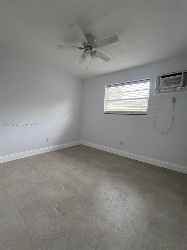 Building Photo - 5990 NE 4th Ct