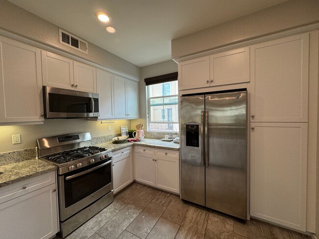 Building Photo - Immediate Move-In! Tastefully FURNISHED mo...