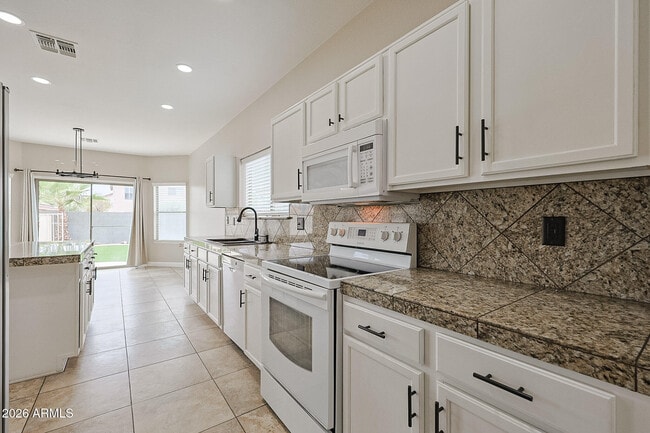 Building Photo - 15569 W Gelding Dr