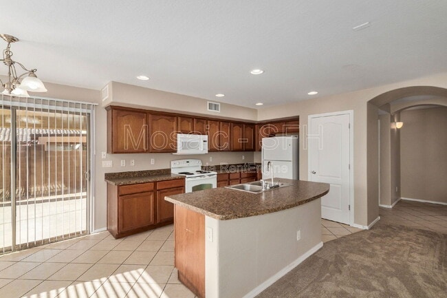 Building Photo - 5215 W Hasan Dr