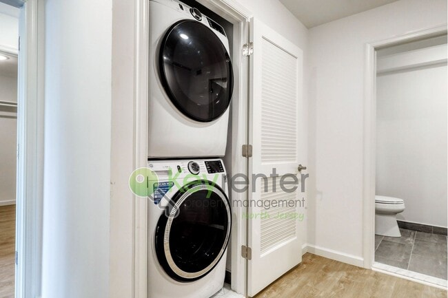 Building Photo - Modern New Construction 2 Bedroom Townhome with Garage & Driveway — First Occupancy!