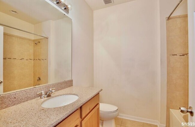 Building Photo - Gorgeous 4/3.5 Home with a Large Fenced Ba...