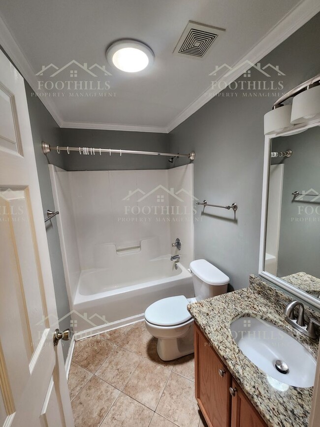 Building Photo - Beautiful 3-Bedroom Brick Home with Sunroo...