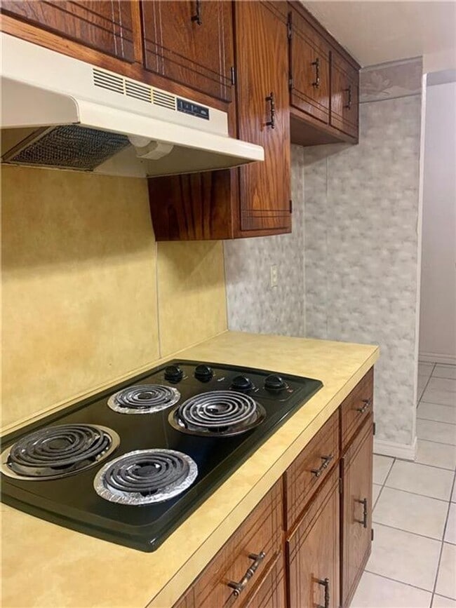 Building Photo - Charming Home with Open Kitchen, Fireplace & 2-Car Garage