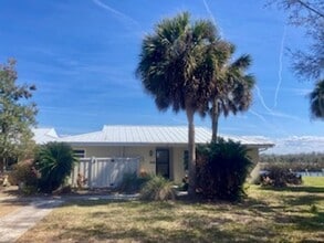 Building Photo - Waterfront condo with community pool!