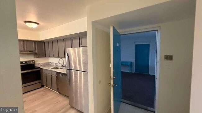 Building Photo - 8103 Greenspring Way