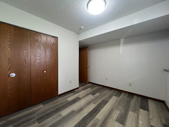 Building Photo - Spacious 2-Bed, 1-Bath Townhome with a Gar...