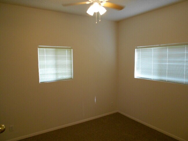 Building Photo - Central North home with big backyard, dual pane windows & more!