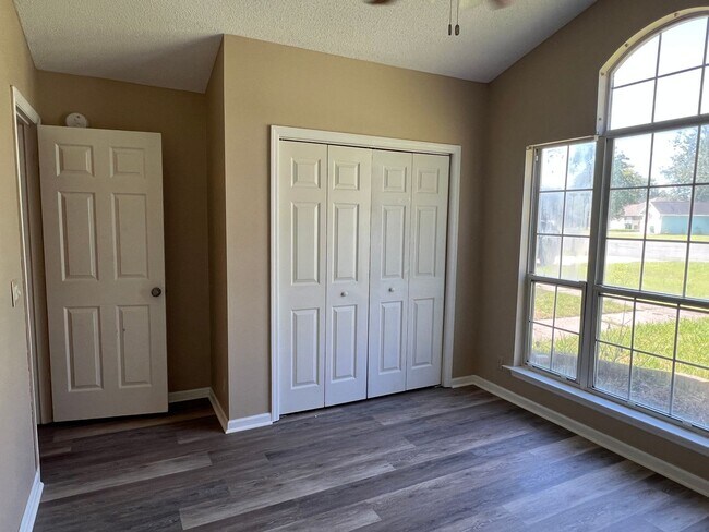 Building Photo - 25% off of 2nd month's rent with a 24 mont...