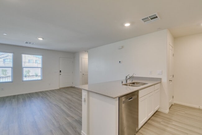 Building Photo - Gorgeous Townhome with upgrades in gated community* 3 large bedrooms, 2 car garage*Community pool...