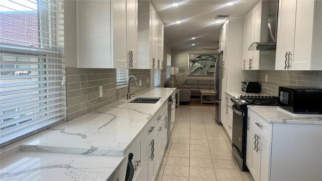 Building Photo - 10036 63rd Ave N