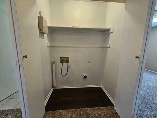 Building Photo - Stunning two-level, two-bedroom, one-and-a-half-bathroom townhome