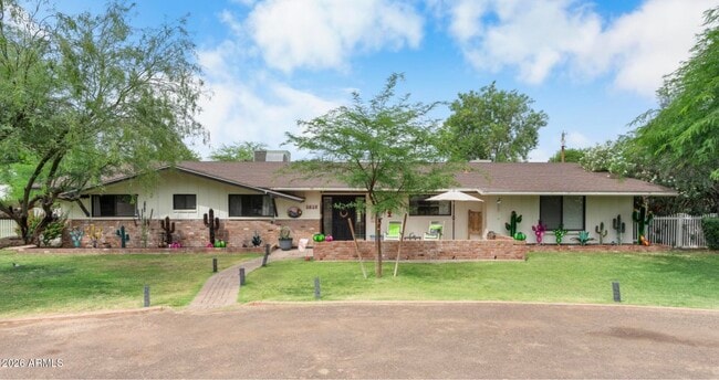 Building Photo - 7026 E Sunnyside Dr