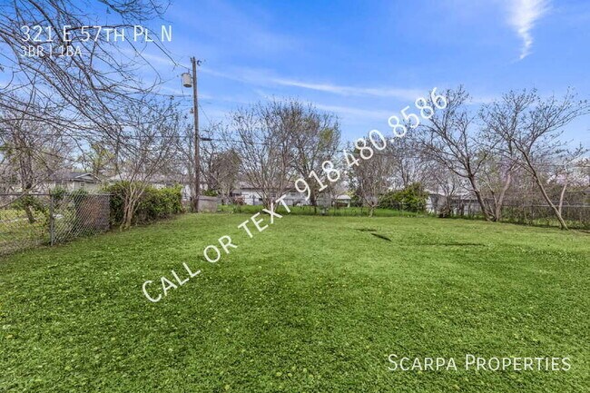 Building Photo - 321 E 57th Pl N