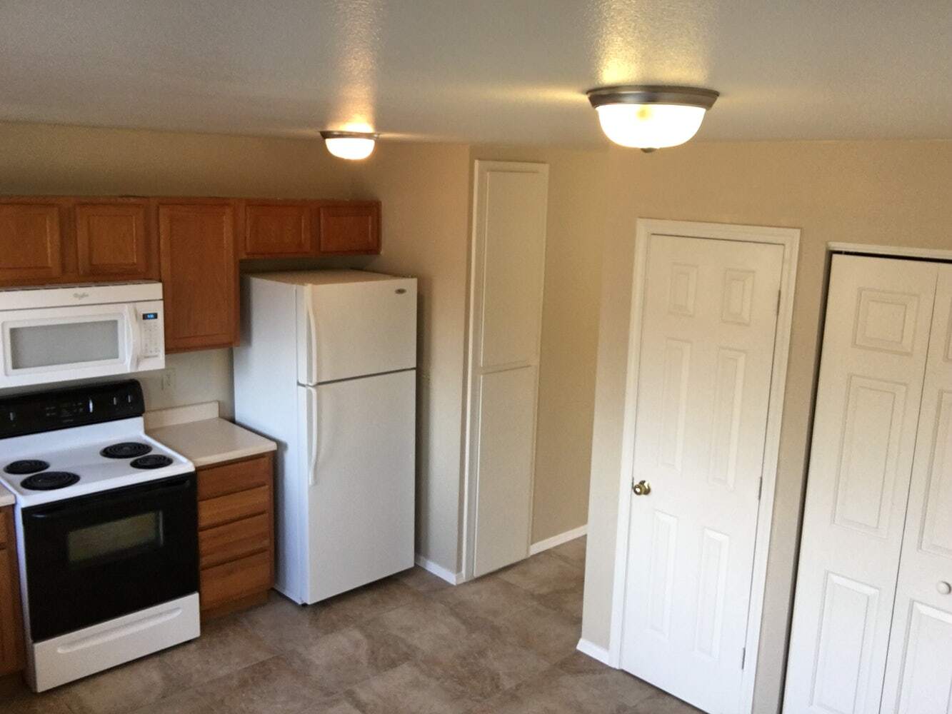 Appliances included, actual floor in kitchen is a dark wood-look - 103 North Harbin Avenue