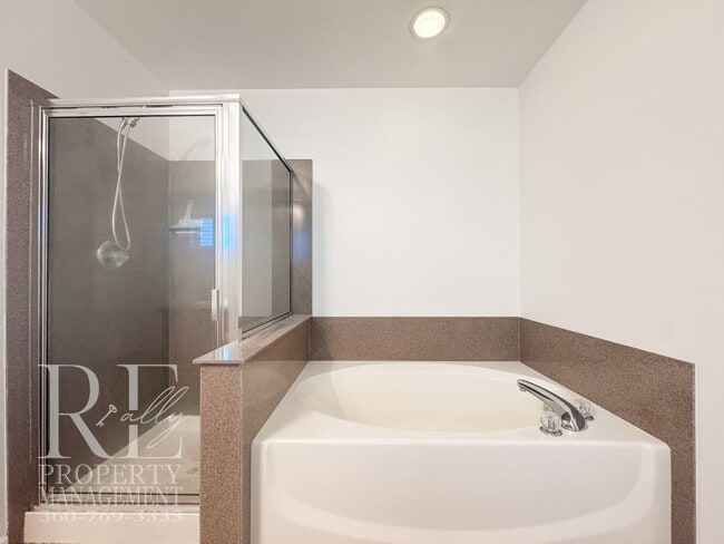Building Photo - Spacious 4-Bedroom Home with Brand-New Carpet, Two Living Areas & Loft