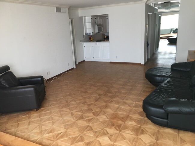 View from dining area of living room, entry area, and kitchen - 969 Hilgard Ave