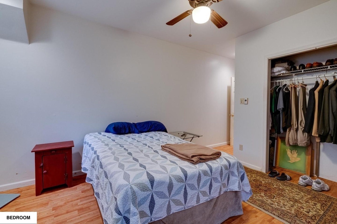 Bedroom with full-size closet. - 513 1/2 W James St