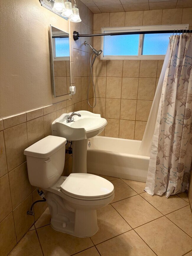 Building Photo - Gated Main House with Private Backyard & Bonus Room