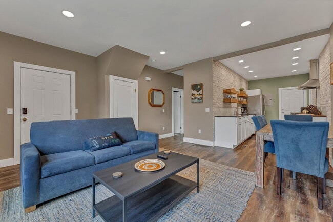 Building Photo - Furnished 1-Bedroom Lower Apartment on Main St