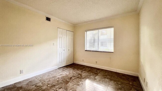 Building Photo - 303 Gardens Dr
