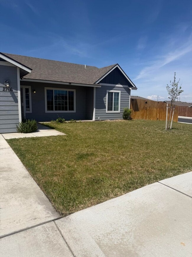 Building Photo - Lots of storage space in this 4- Car garage for all your playthings!!